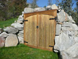 Root cellar with boulder rock walls