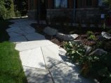 Closer look at fitted flagstone walkway