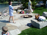 Iron fire pit inset in more flagstone patio