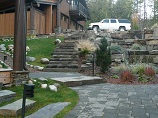 Full view of paver pathway with landscape lighting