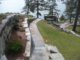 Cut stone pathway, retaining wall and pathway lighting