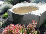 Natural stone bird bath
