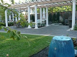 Fountain with paver patio and custom pergola