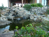 More drystacked retaining walls with water feature