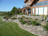 Drystacked rock retaining walls  on sun drenched exposure