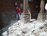 Using a jackhammer to break up an existing porch